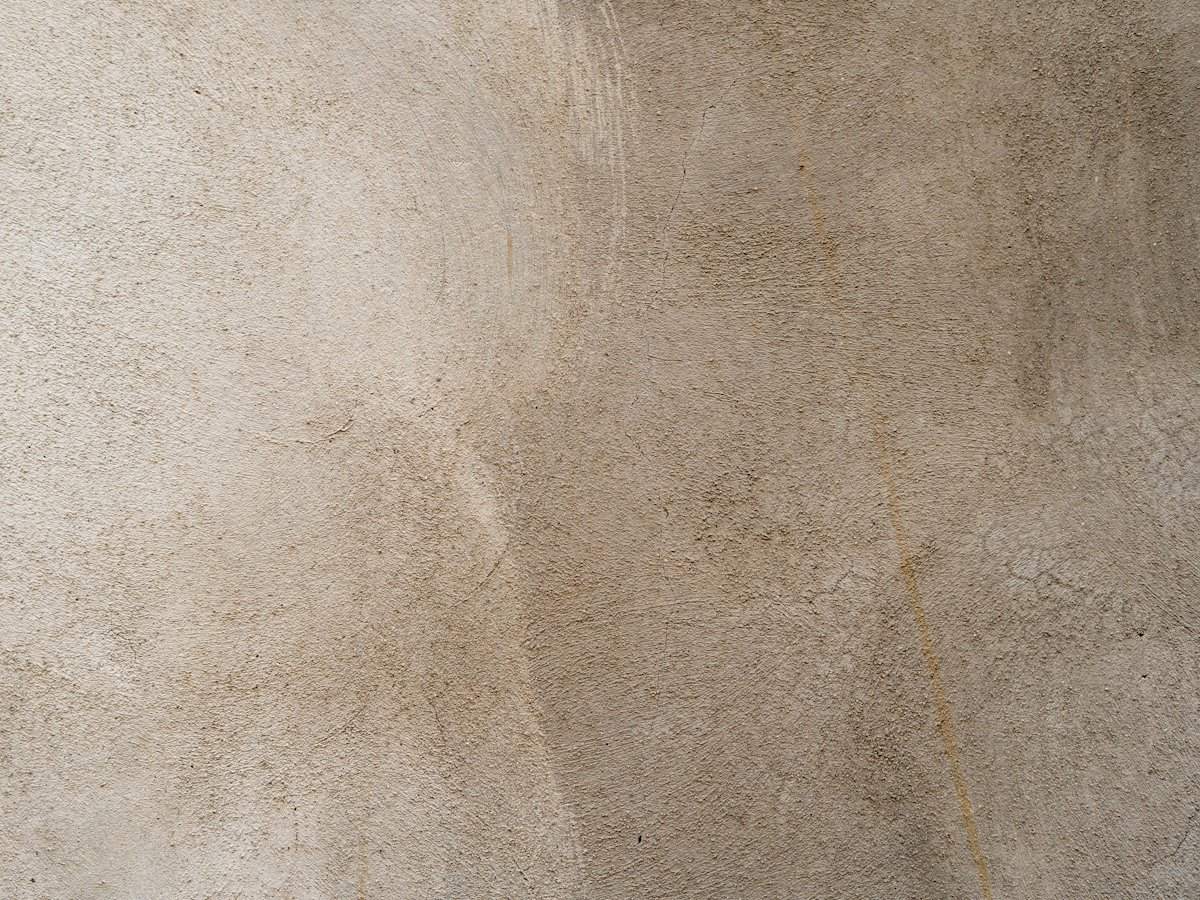 Close-up of a hand-polished Venetian plaster wall finish